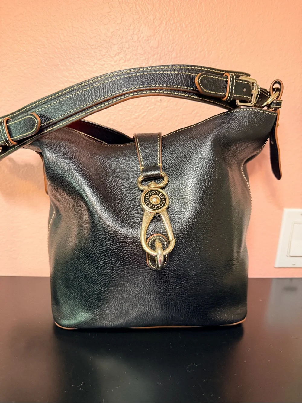 Dooney & Bourke Black Leather Shoulder Bag with Brass Hardware